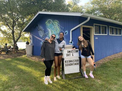 Gisela, right, with friends at the Buccaneer Boathouse during RA and OL orientation, summer 2023.