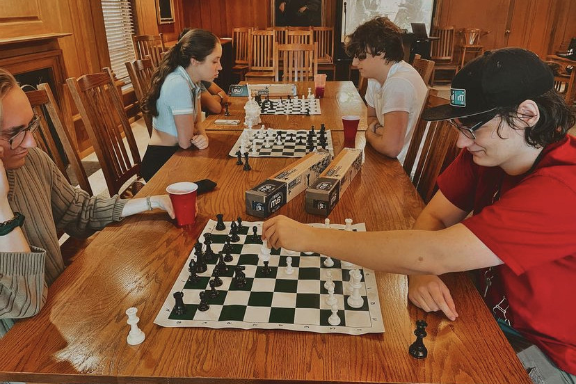 Chess Club members play together in the Presidents Lounge.